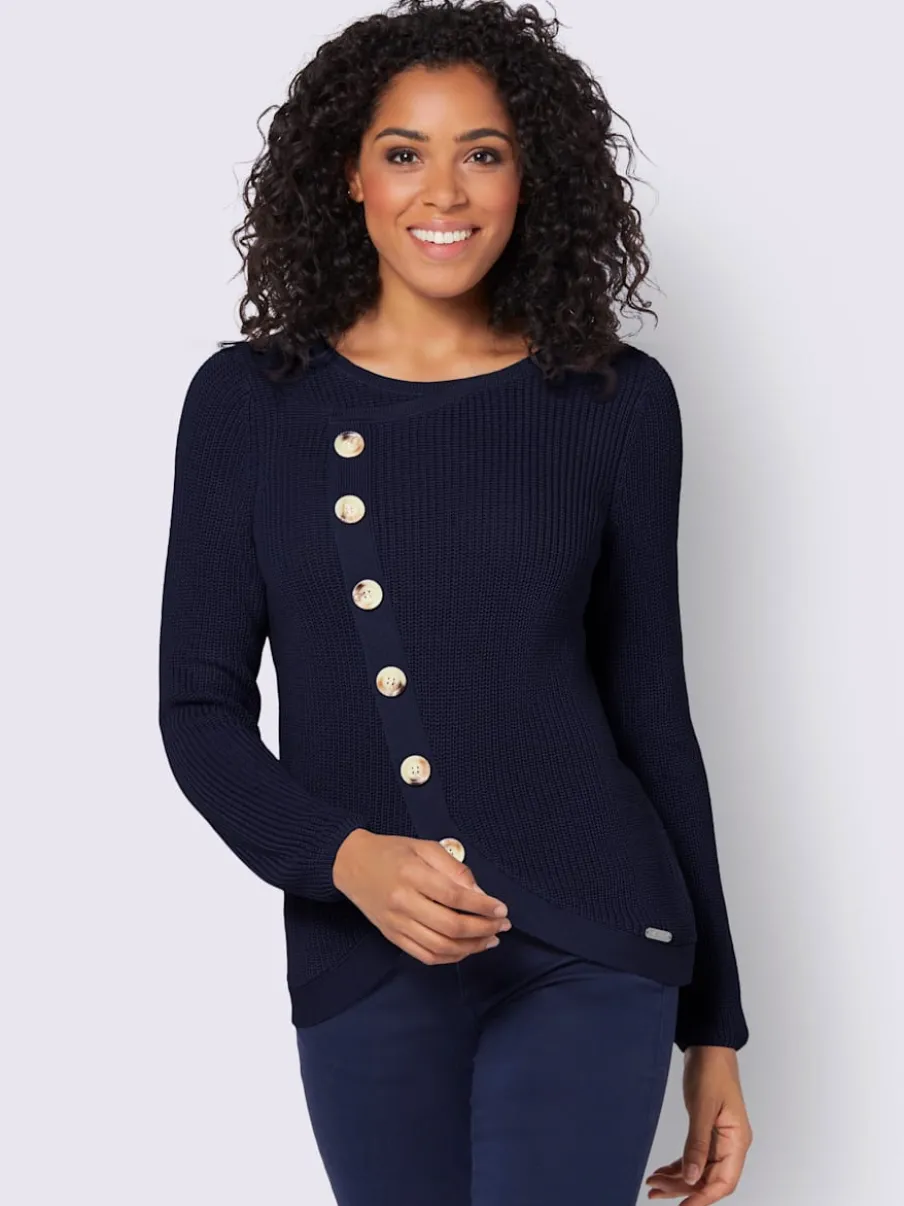 Pull avec boutonnières avant à effet affinant et côtelé