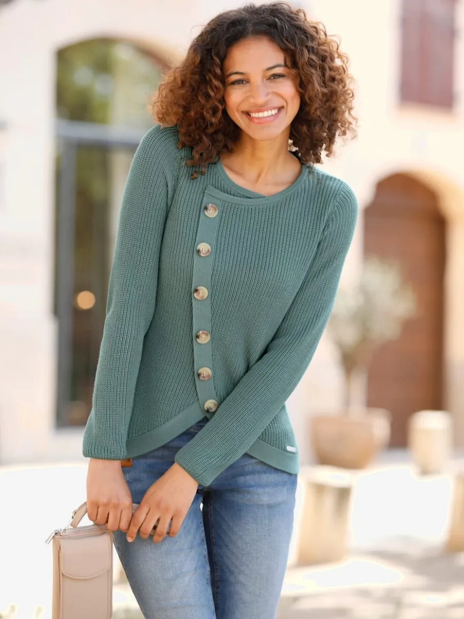 Pull avec boutonnières avant à effet affinant et côtelé
