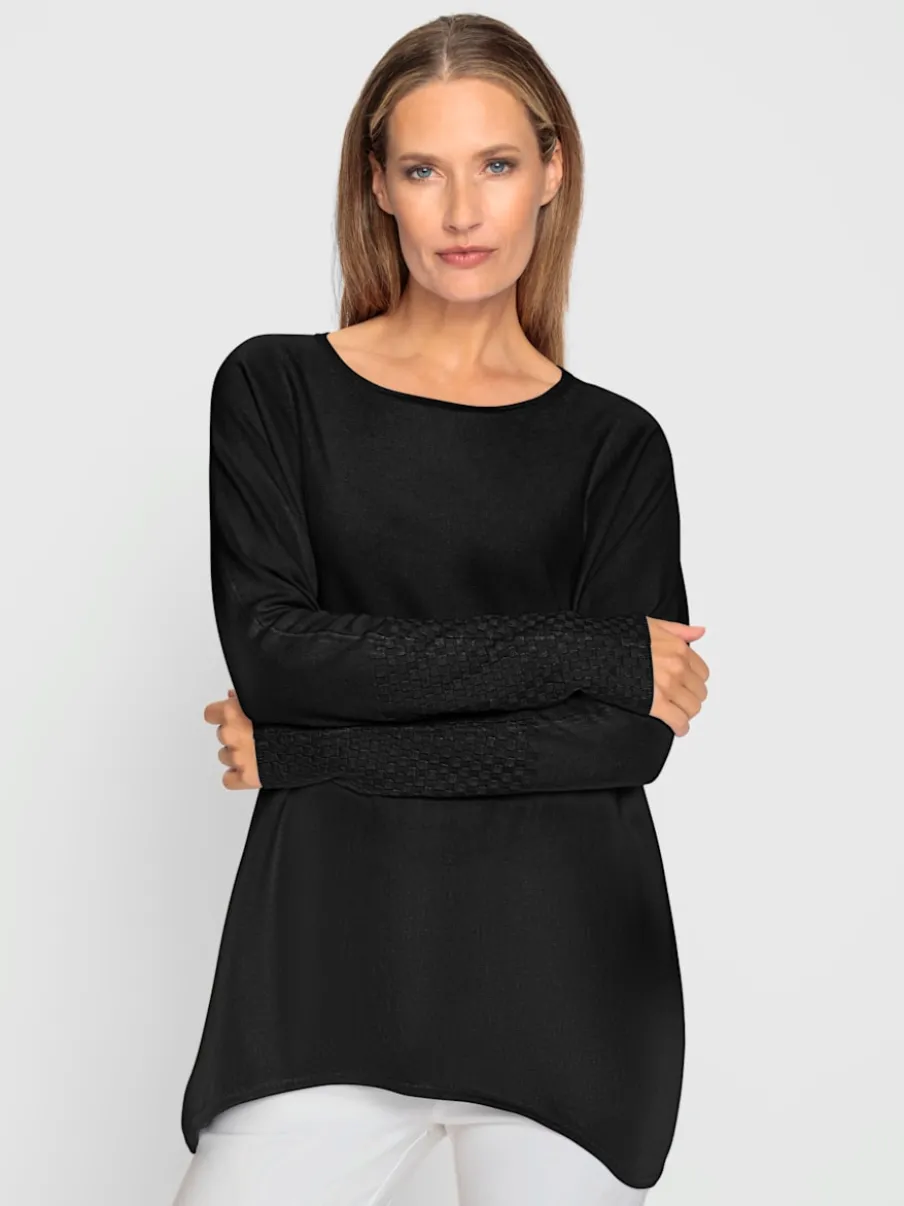 Pull avec col rond et manches chauve-souris en tricot doux