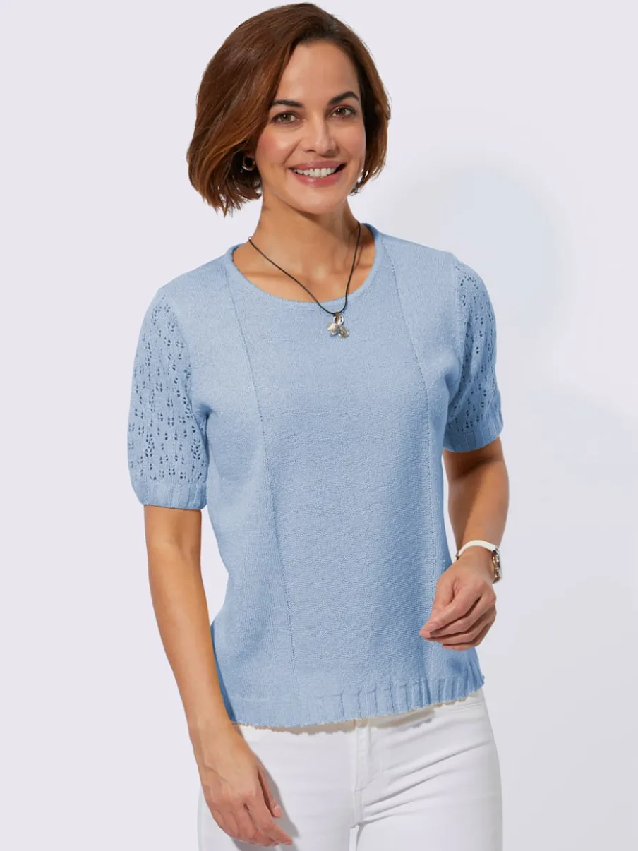 Pull bouclé avec motif ajouré et manches côtelées