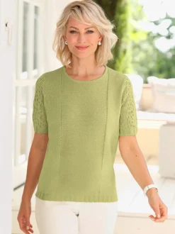 Pull bouclé avec motif ajouré et manches côtelées