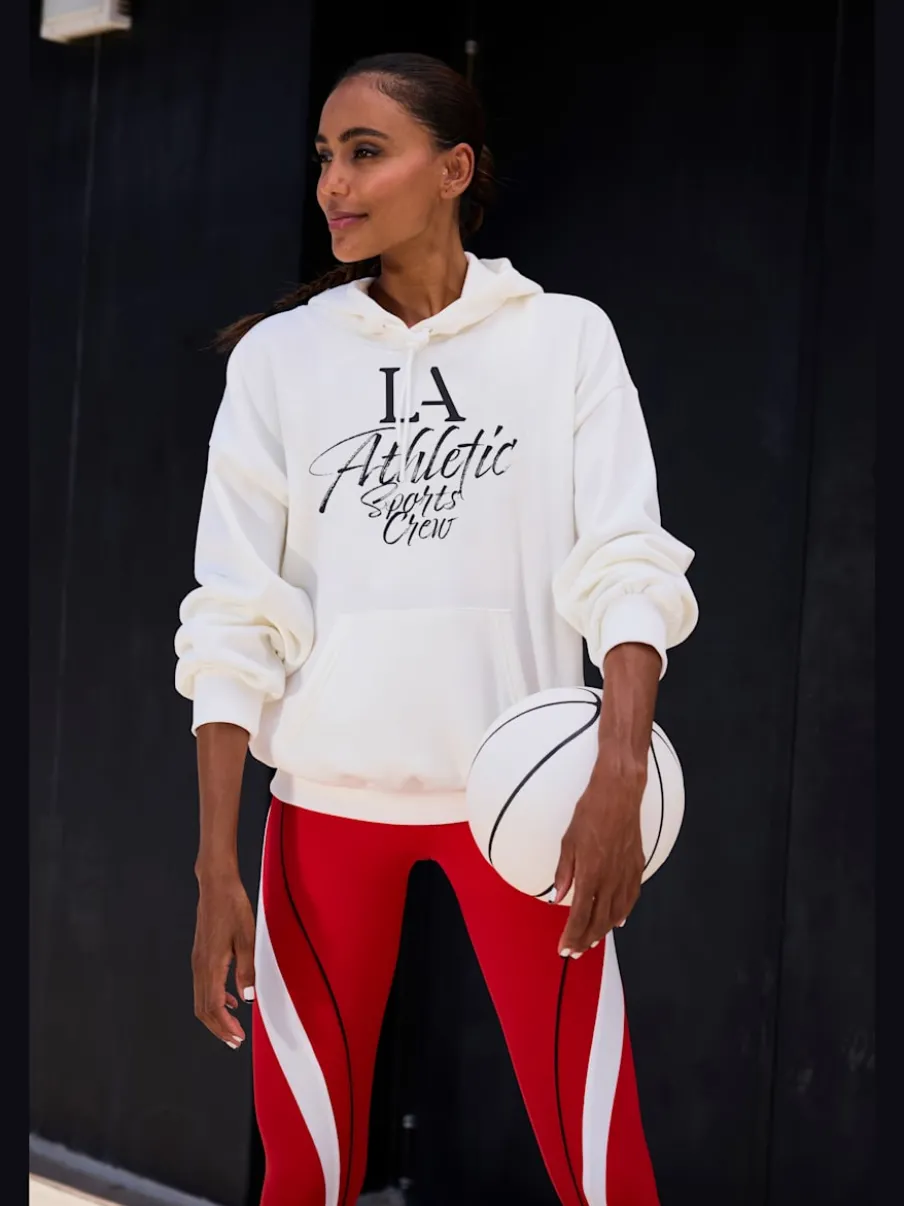 Pull à capuche avec cordon et inscription sportive devant