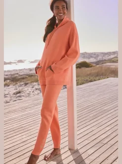 Pull à capuche en tricot avec logo brodé doux