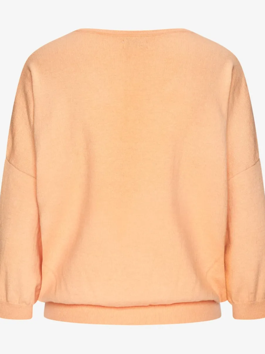 Pull chauve-souris avec encolure V et manches 3/4 en tricot doux