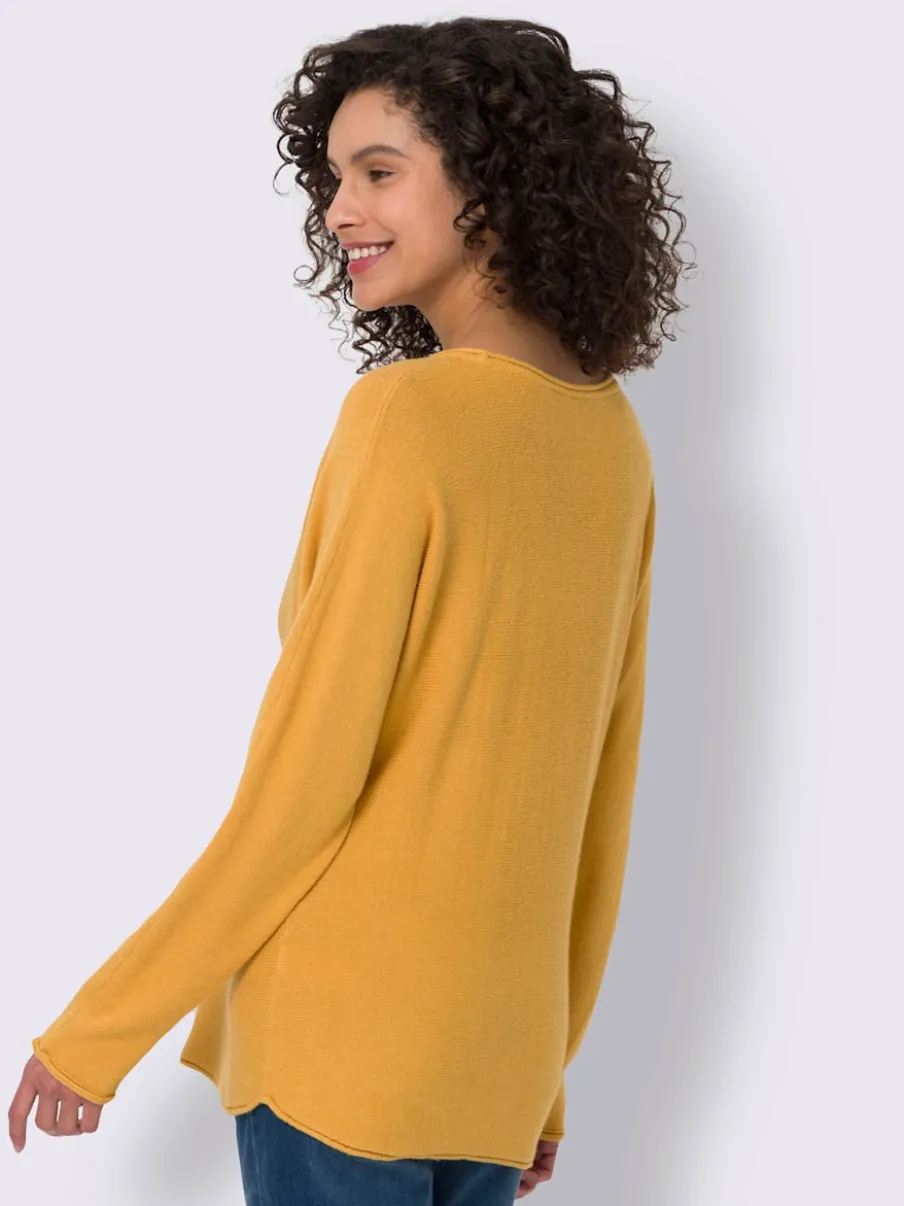 Pull chauve-souris doux avec motif cœur brillant