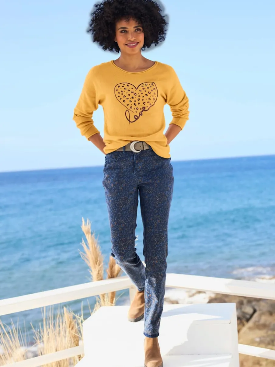 Pull chauve-souris doux avec motif cœur brillant