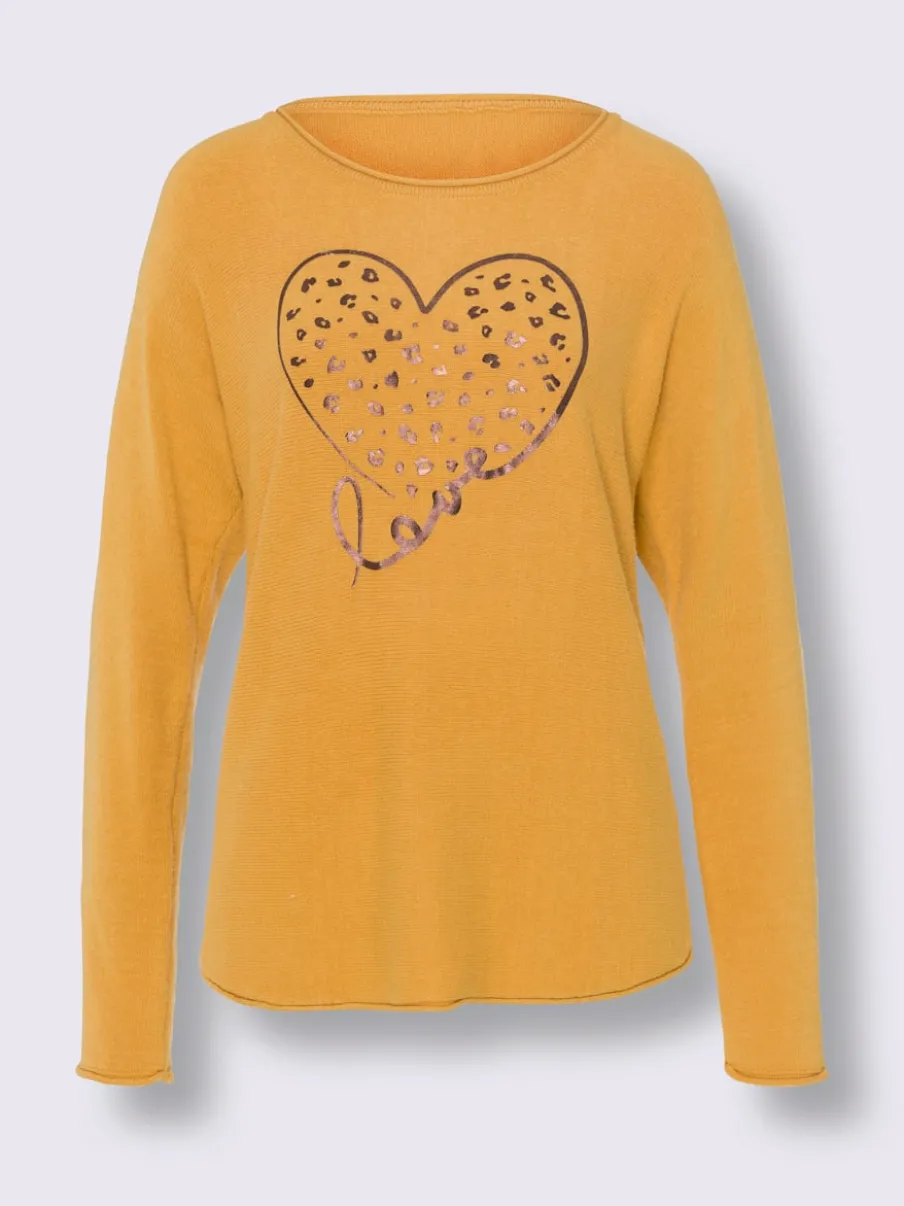 Pull chauve-souris doux avec motif cœur brillant