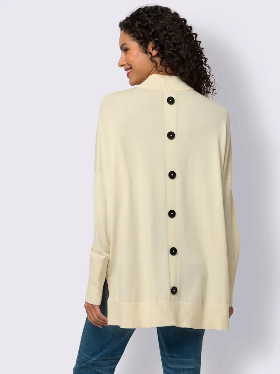 Pull à col montant avec boutons décoratifs au dos