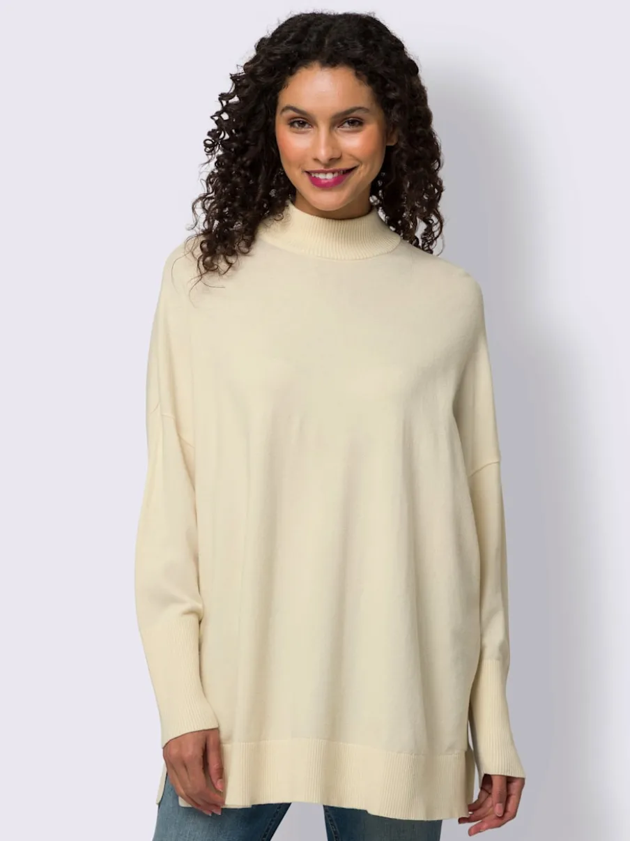 Pull à col montant avec boutons décoratifs au dos