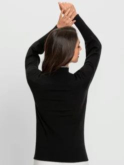 Pull à col montant avec broderie et lavallière