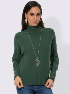 Pull à col montant avec manches chauve-souris et ornements
