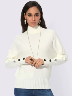 Pull à col montant avec manches chauve-souris et ornements