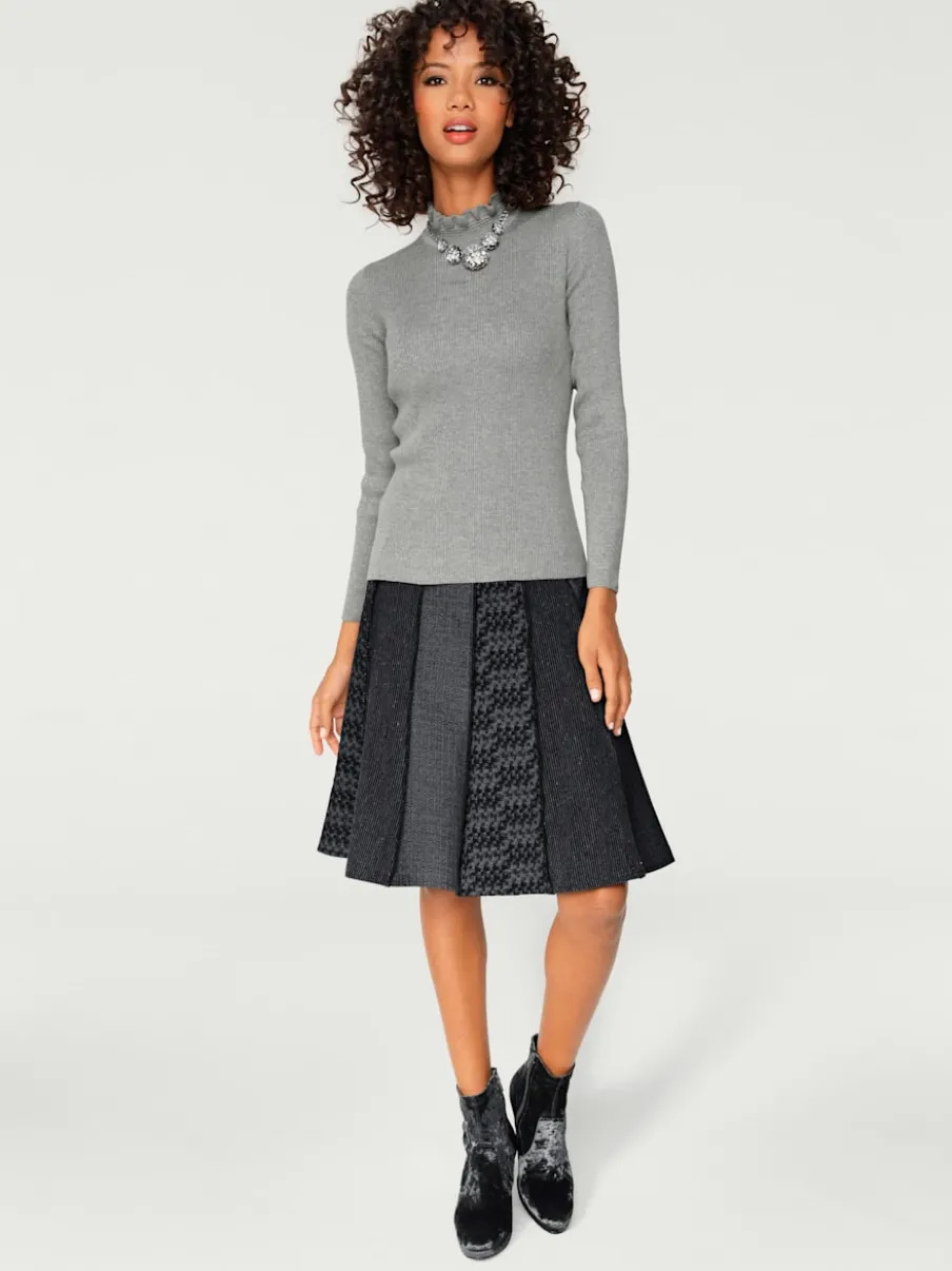 Pull à col montant avec manches longues et coupe ajustée