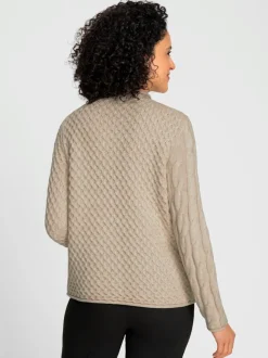 Pull à col montant à motifs géométriques et torsadés