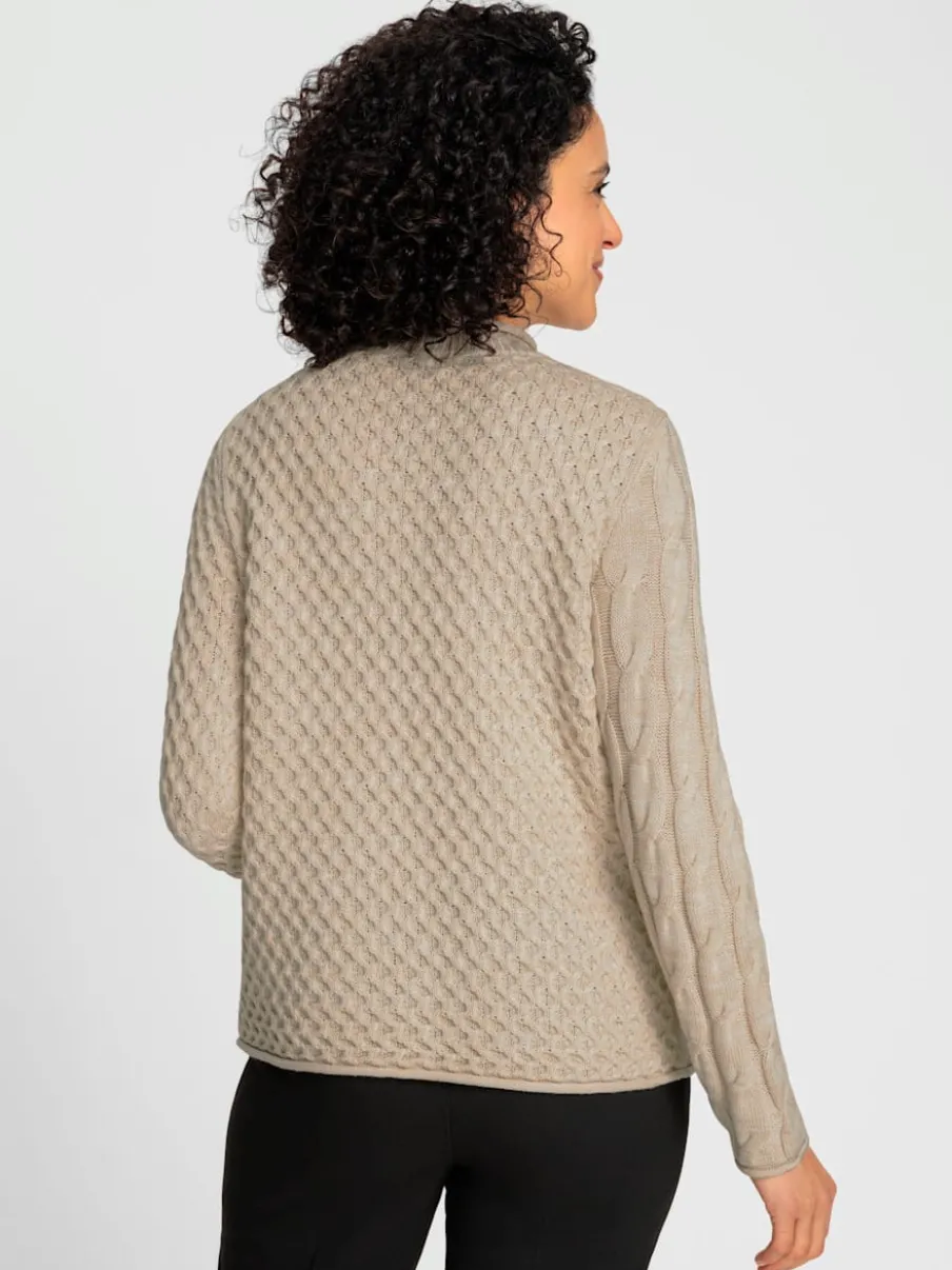 Pull à col montant à motifs géométriques et torsadés