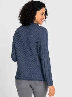 Pull à col montant à motifs géométriques et torsadés