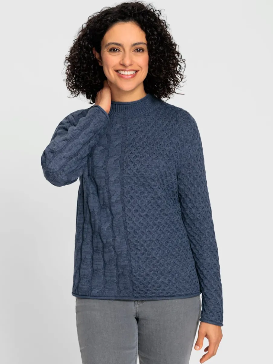 Pull à col montant à motifs géométriques et torsadés