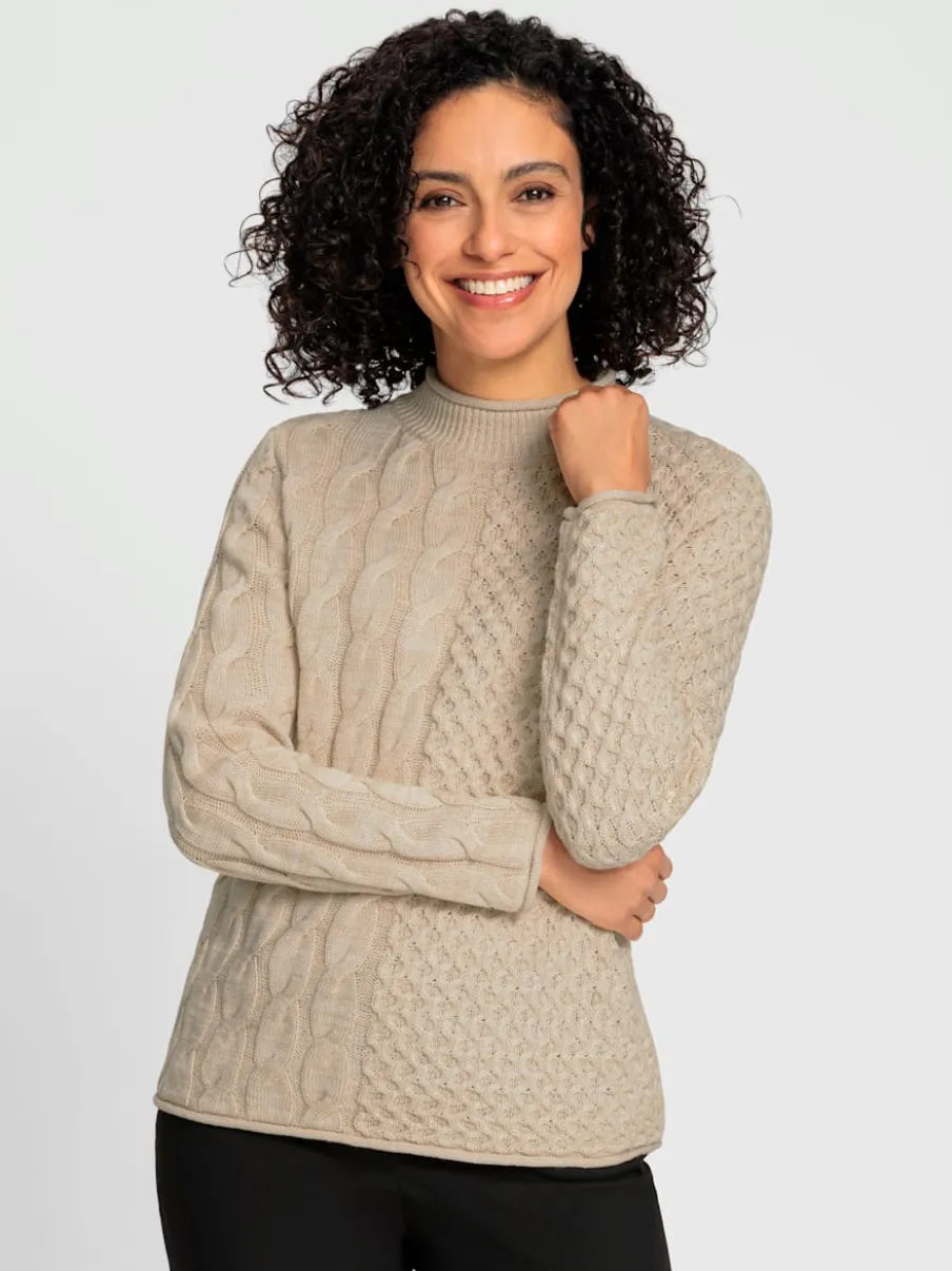 Pull à col montant à motifs géométriques et torsadés