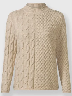 Pull à col montant à motifs géométriques et torsadés