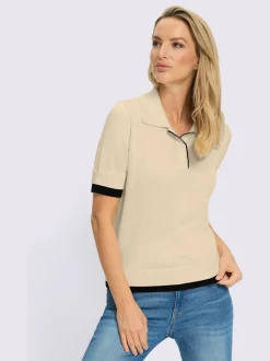 Pull à col polo avec empiècements contrastés et manches courtes
