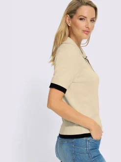 Pull à col polo avec empiècements contrastés et manches courtes