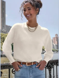Pull col rond avec manches longues et boutons doux