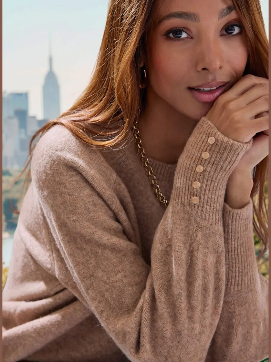 Pull col rond avec manches longues et boutons doux