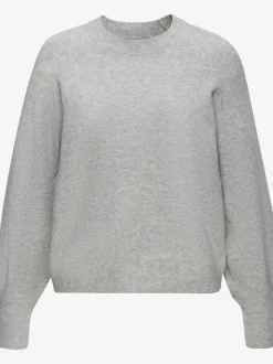 Pull col rond avec manches longues et boutons doux