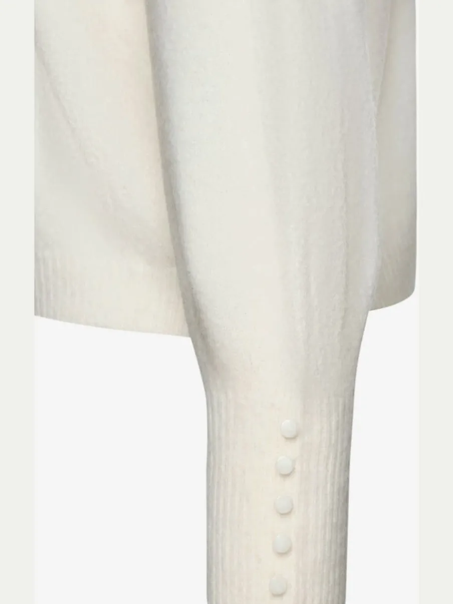 Pull col rond avec manches longues et boutons doux