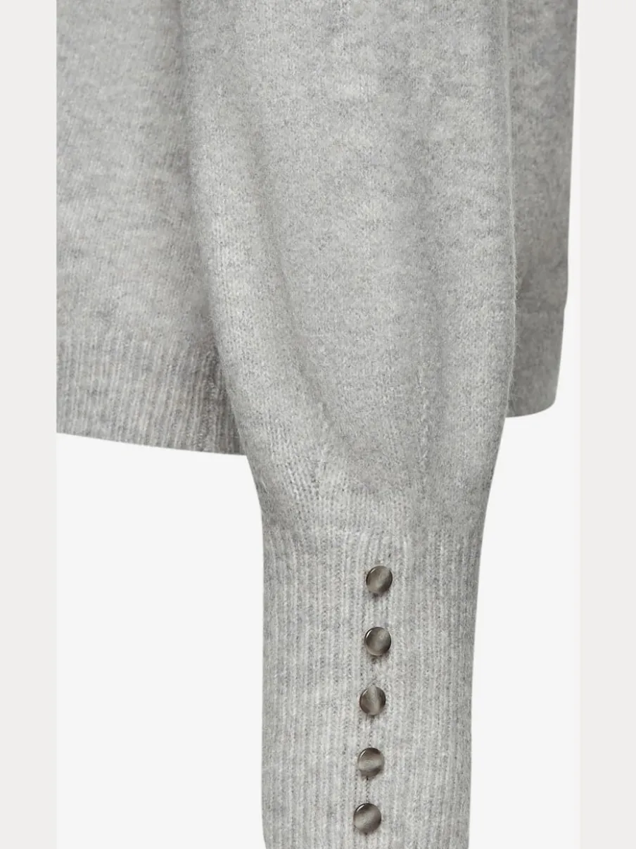 Pull col rond avec manches longues et boutons doux