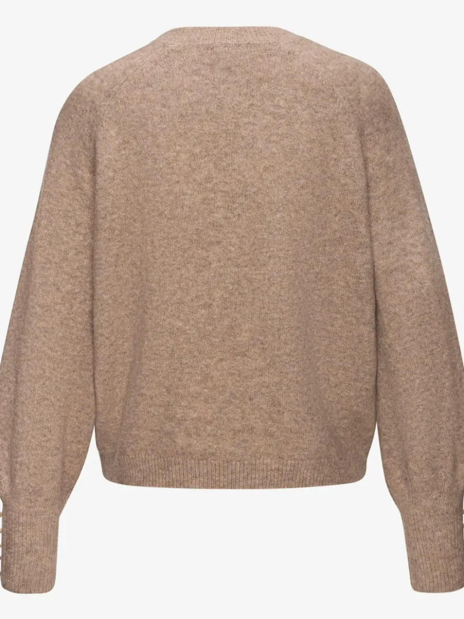 Pull col rond avec manches longues et boutons doux