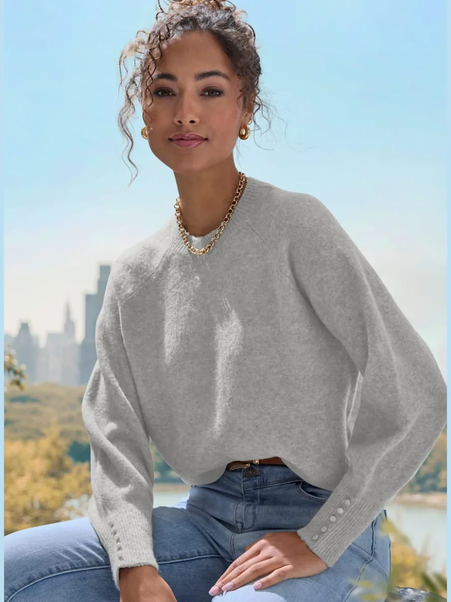 Pull col rond avec manches longues et boutons doux