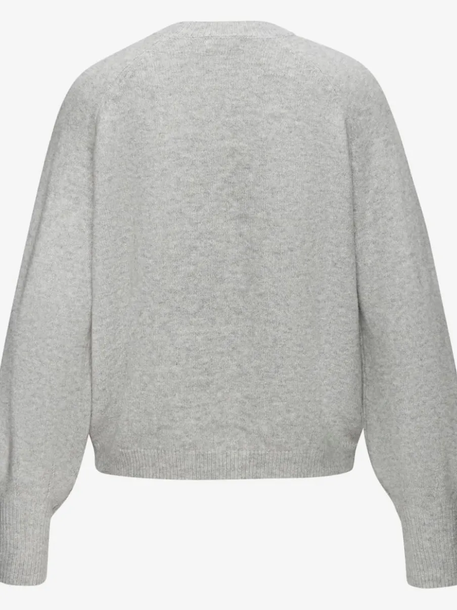 Pull col rond avec manches longues et boutons doux