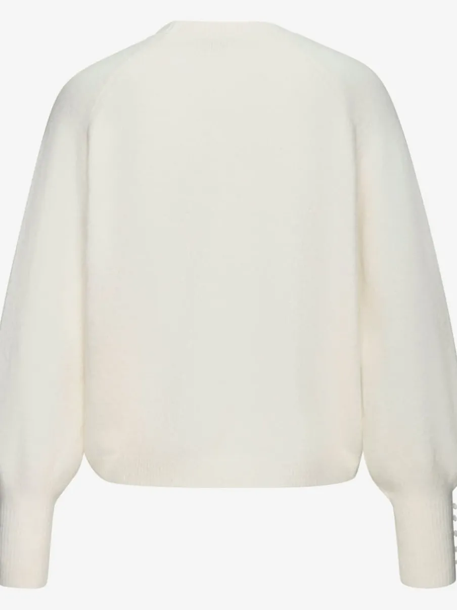 Pull col rond avec manches longues et boutons doux