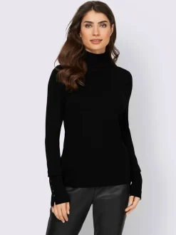 Pull à col roulé avec manches longues et boutons décoratifs