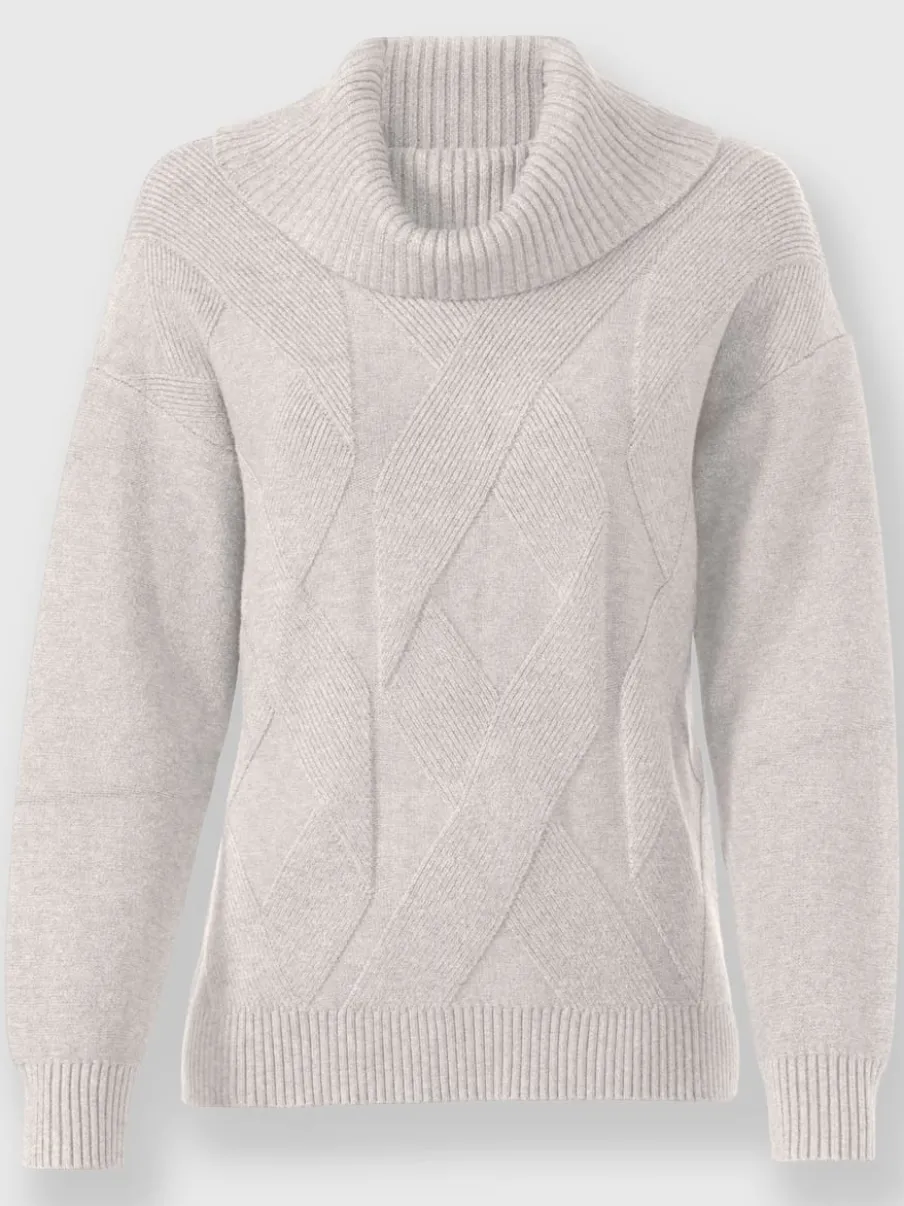 Pull à col roulé avec motif torsadé et manches longues