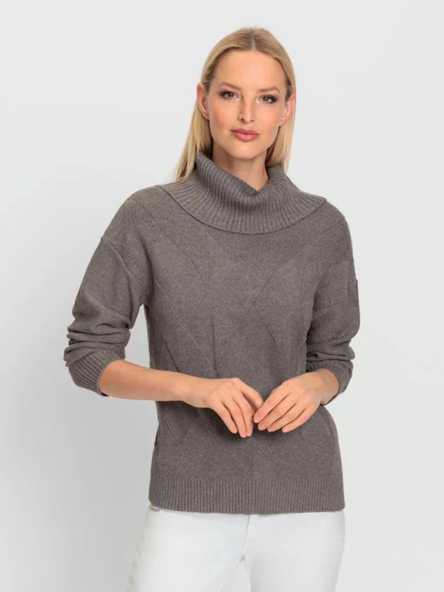 Pull à col roulé avec motif torsadé et manches longues