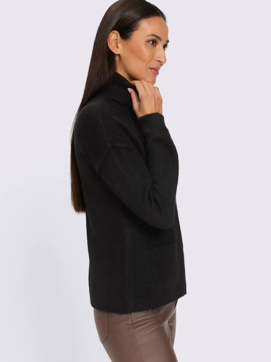 Pull à col roulé couture centrale devant