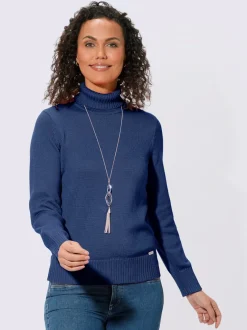 Pull col roulé à emmanchures diminuées finitions côtelées