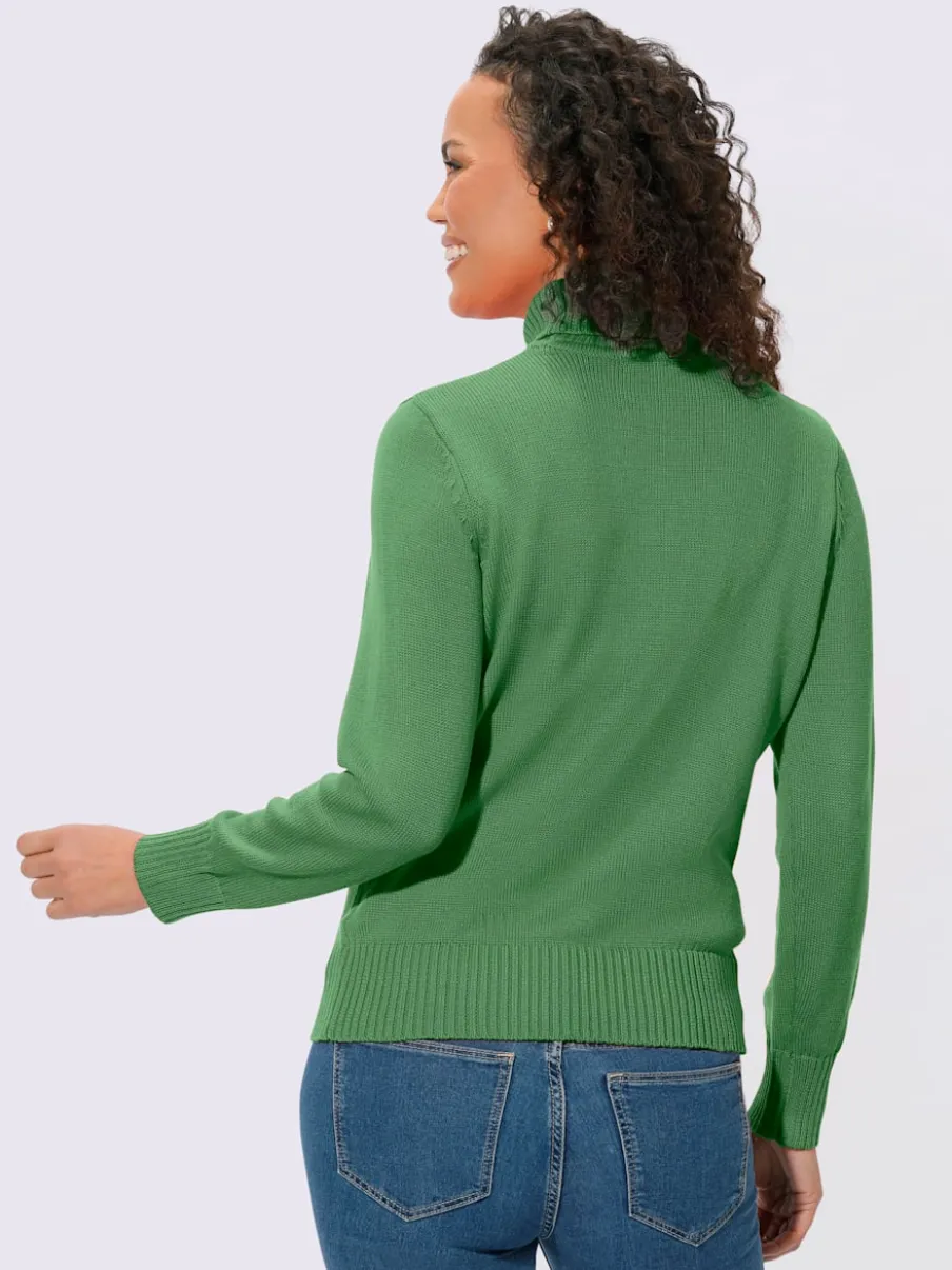Pull col roulé à emmanchures diminuées finitions côtelées