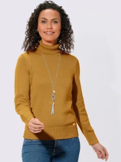 Pull col roulé à emmanchures diminuées finitions côtelées