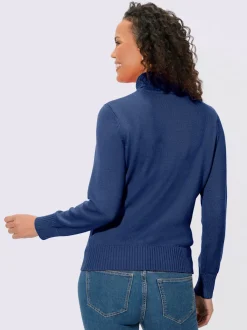 Pull col roulé à emmanchures diminuées finitions côtelées