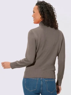 Pull col roulé à emmanchures diminuées finitions côtelées