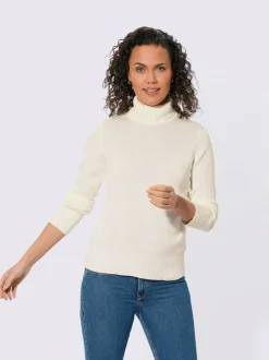 Pull col roulé à emmanchures diminuées finitions côtelées
