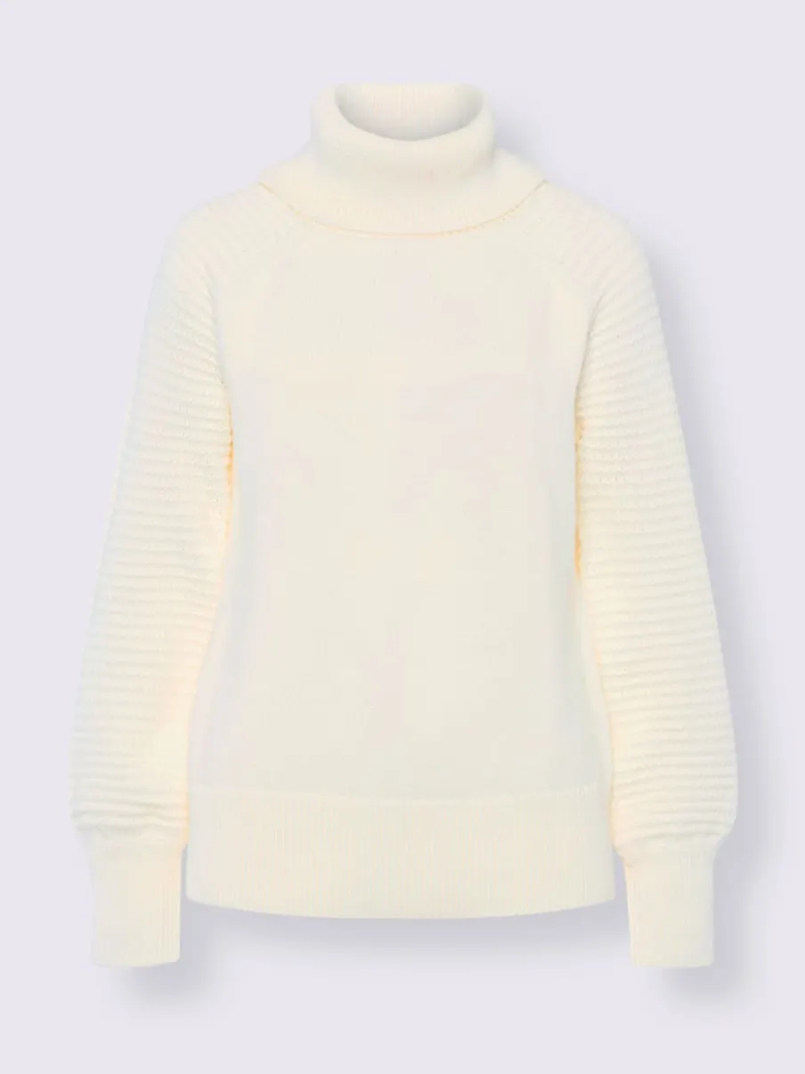 Pull à col roulé en pur coton avec manches ballon et bords-côtes