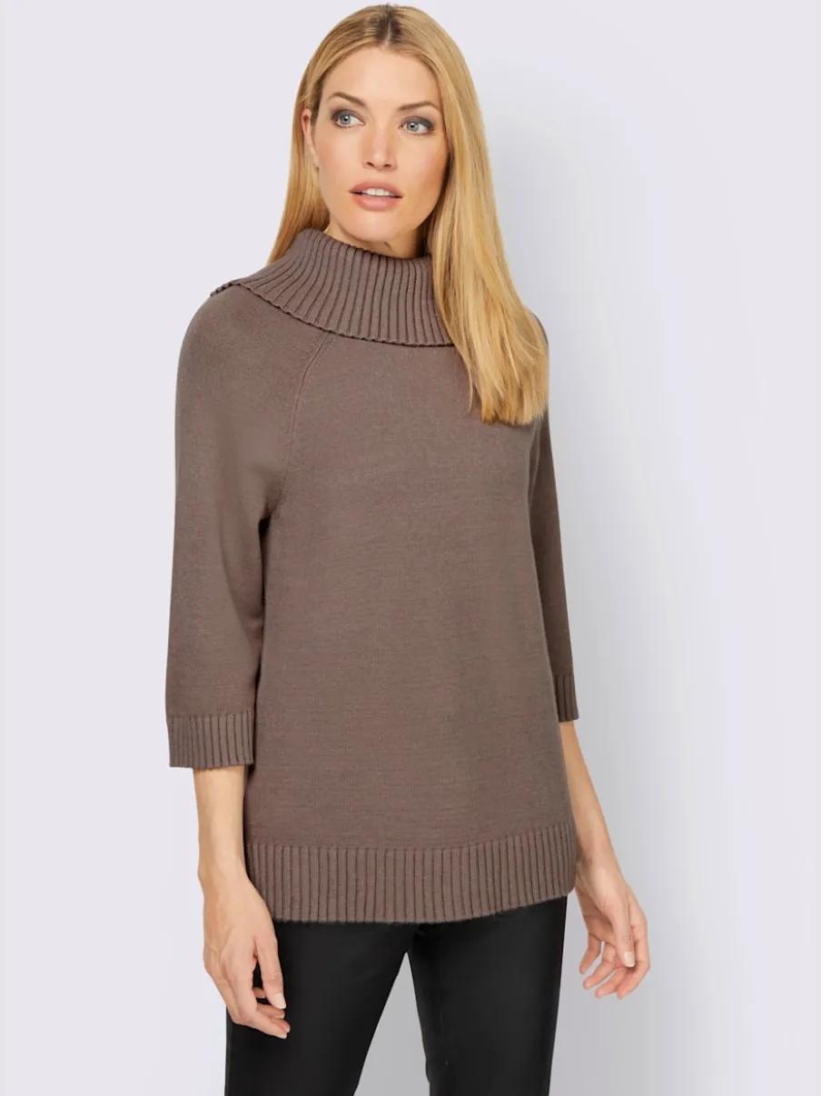 Pull col roulé à manches 3/4 avec fente latérale