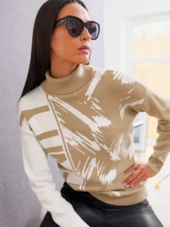 Pull col roulé à motif jacquard et manches longues