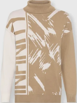 Pull col roulé à motif jacquard et manches longues