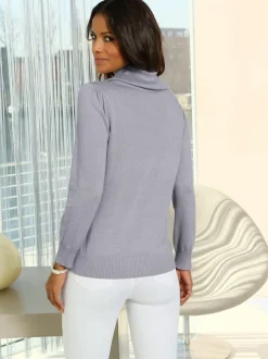 Pull confortable col roulé manches froncées en maille douce