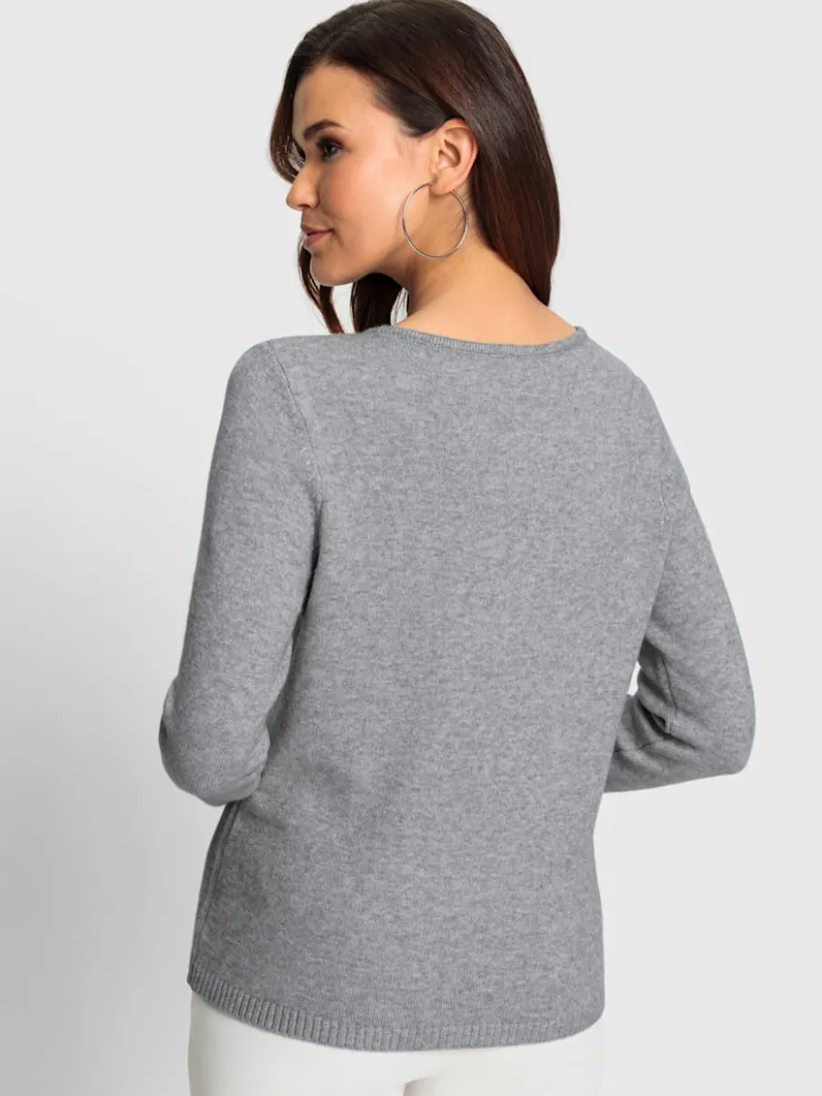 Pull encolure ronde motifs floraux et pierres brillantes